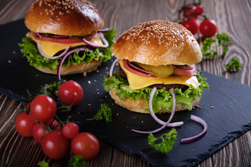Hamburger with cutlet and cheese.