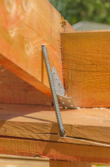 crack, frame house made of wood, roof metal bracket split Board