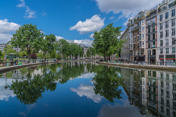 Canal St. Martin in Paris on a beautiful sunny day with reflections in the water