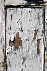 Old wooden wall covered with paint