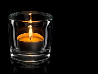 Candle in a glass candlestick