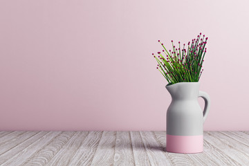 Vase with flowers on pink background