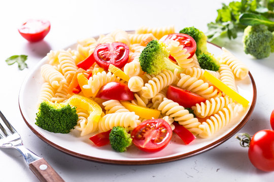 Vegan pasta fusilli with vegetables. 
