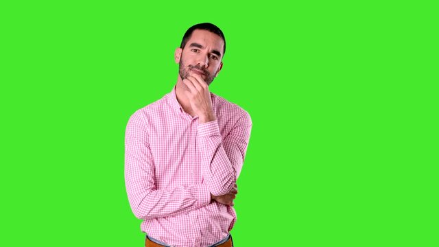 Confident young man with a gesture of doubt - Chroma background