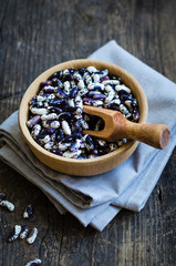 Obraz na płótnie Canvas Purple grains-beens in a bowl