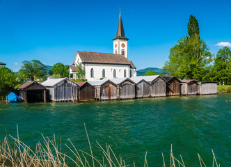 The charming village of Busskirch (Kirchdorf), Rapperswil-Jona, Sankt Gallen, Switzerland. Located in an idyllic lakeside shore of the Obersee (Upper Lake Zurich)