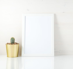 Mockup with clean white frame and succulent on white background