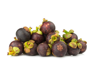 mangosteen pile isolated on white background