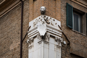 Fototapeta na wymiar FERRARA, ITALY - May 01, 2018: details of Palace Jule d’Este in Hercules d’Este street, Ferrara, Emilia-Romagna, Italy