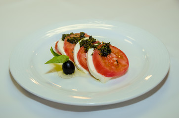 Caprese italian salad in white background
