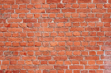 Red Brick Wall Old Weathered Texture Background. Abstract Grunge Stone Pattern, Aged Red Wall with Small Cracks. Rustic Brick Wall Fragment, Empty Brickwork Surface Wallpaper with Blank Copy Space.