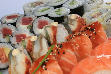 A large set of sushi rolls