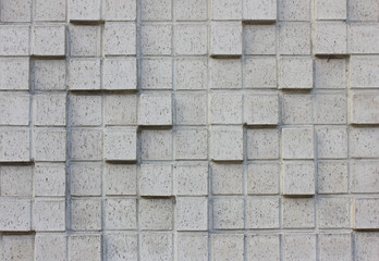 Obraz premium Ornamental Gray Brick Wall Texture Background. Decorative Brickwork Pattern of Grunge Aged Brick Wall. Stone Material Surface Close Up, Grungy White Brick Textured Wall with Empty Copy Space.