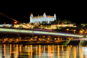 Naklejka premium Bratislava, Slovakia May 23, 2018: Bratislava Castle or Bratislavsky Hrad is the main castle of Bratislava, capital of Slovakia by night. Bratislava Castle is located on rocky hill.
