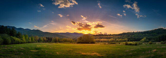 Panoramic sunset on the High Peaks Region in the Adirondacks as seen from Keene, NY