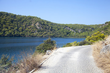 the sun, the sea, the mountains  and the road
