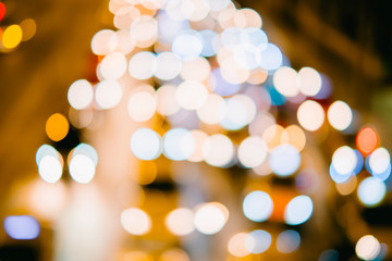 Colorful of traffic light at night. Blur road and bokeh background