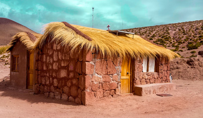 Fototapeta na wymiar Adobe house with solar heating at San Pedro de Atacama, Chile, South America