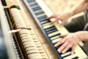 pianist hands on a keyboard