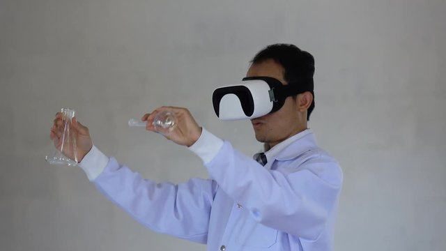 futuristic medical technology. Doctor using goggle reality with AR technology for chemical formula analysis. - Powered by Adobe