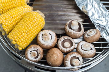 Corn and mushroom on the barbeque