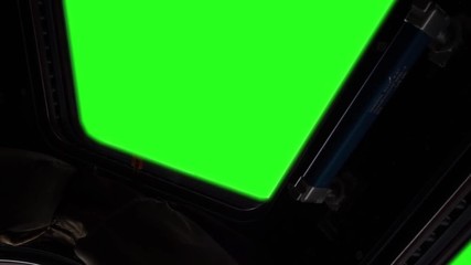 (ISS) International Space Station Window with Green Screen. Zoom Out Slow. Elements of this image furnished by NASA.