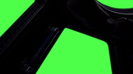 (ISS) International Space Station Window with Green Screen. Zoom Out. Elements of this image furnished by NASA.