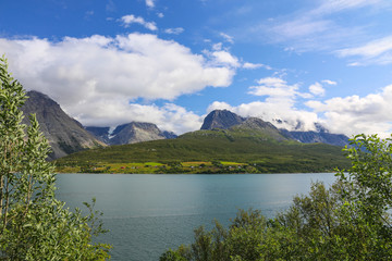 Naklejka na ściany i meble White clouds in Troms county Northern Norway