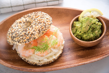 bagel sandwich with shrimp and avocado