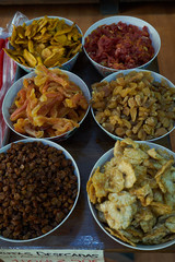 Street market with seasonal tasty fruits and sweets