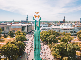 RIGA - 22 MAY, 2018: Amazing Aerial View of the Statue of Liberty Milda in Riga, Latvia during Riga Lattelecom International Marathon 2018.