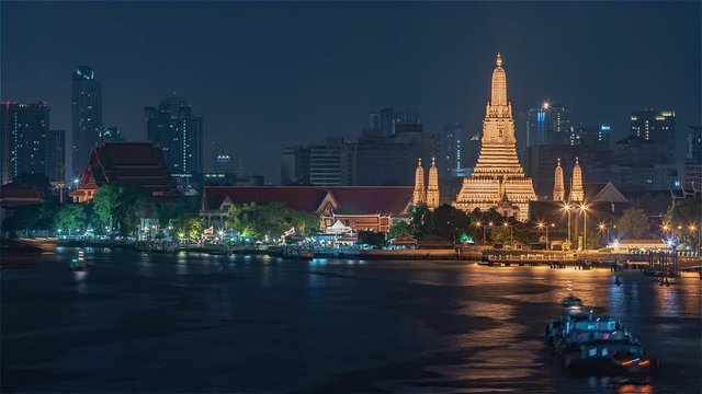 4K Timelapse Sequence of Bangkok, Thailand - The Buddhist temple Wat Arun in Bangkok at night