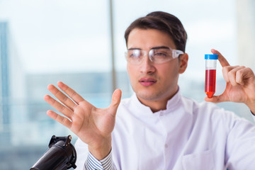 Male chemist working in lab