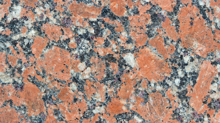 High detailed red granite with natural pattern.