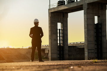 Engineers, business men meeting, engineering architect drawing. Concept of  engineering standing orders for construction crews to work safely