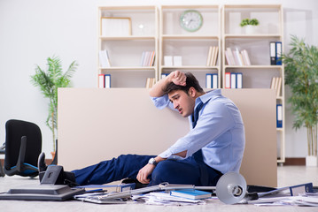 Angry businessman frustrated with too much work