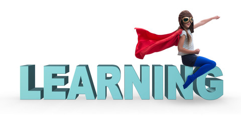 Superhero little girl in education concept