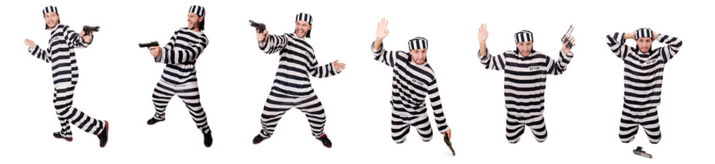 Prison inmate with gun isolated on white