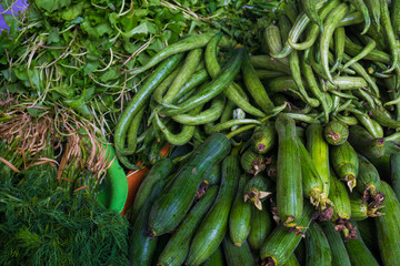 Green zucchini close up in local market