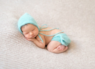 sleeping newborn baby girl