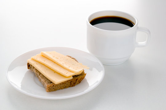 coffee cup and cheese sandwith for breakfast