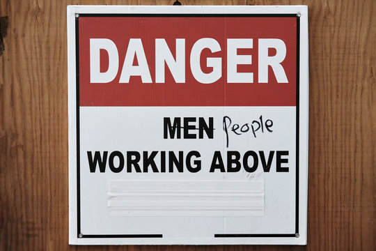 Obsolete sign on the construction site. Women's Movement for Equality