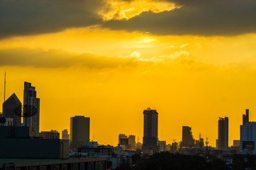 Fototapeta na wymiar City building silhouette sunset metropolitan background