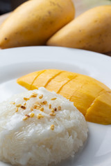 Mango Sticky Rice with white plate,Thai dessert.