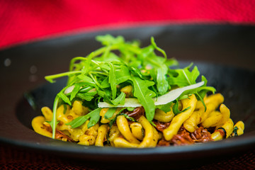 Pasta in souce on plate. Delicious pasta. Food detail.Traditional italian cuisine