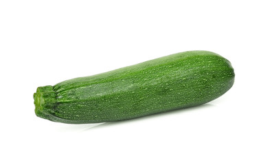 single fresh green zucchini isolated on white background