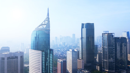 Office buildings in the misty morning