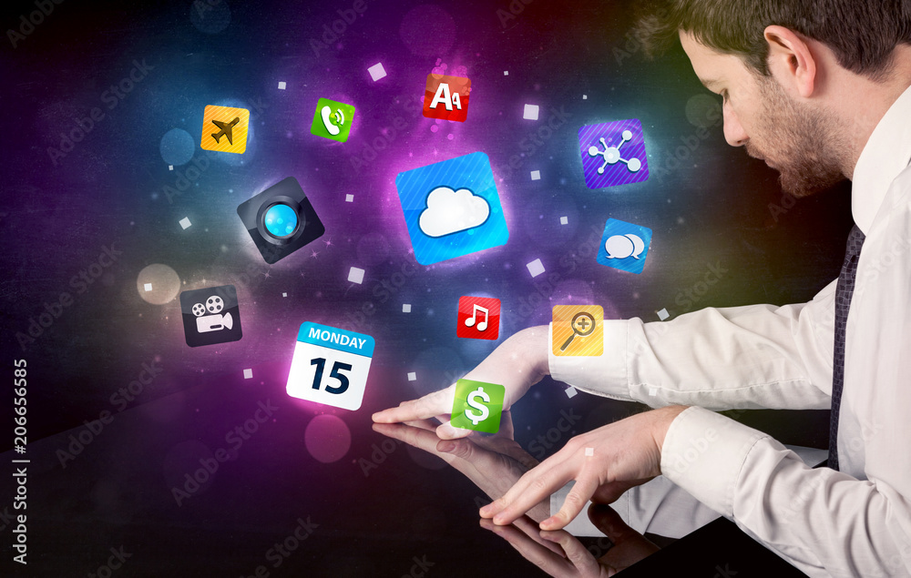 Poster Male hands touching interactive table with colorful application icons on it 