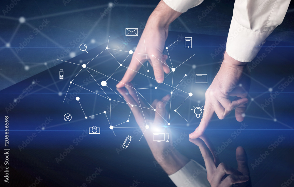 Poster male hands touching interactive table with blue mixed communication icons in the background
