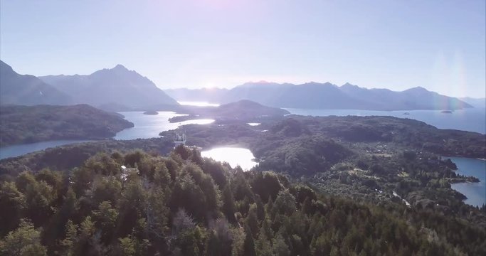 Aerial view of a Patagonian Lenga Forest and a marvelous panoramic view of the lake Nahuel Huapi in Bariloche, Argentina. 4k